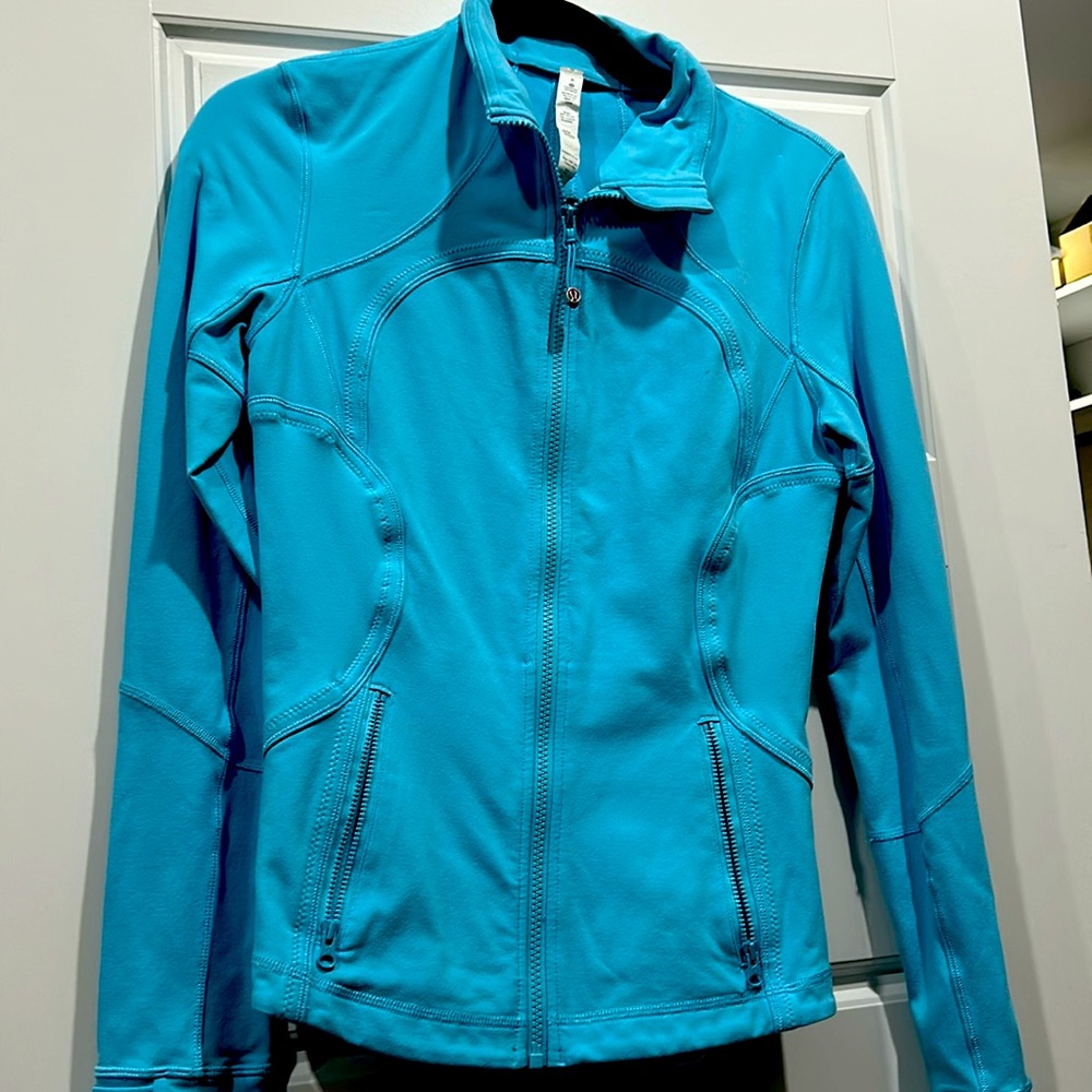 Like new Lululemon Jacket size 8 in blue. Like new hardly worn